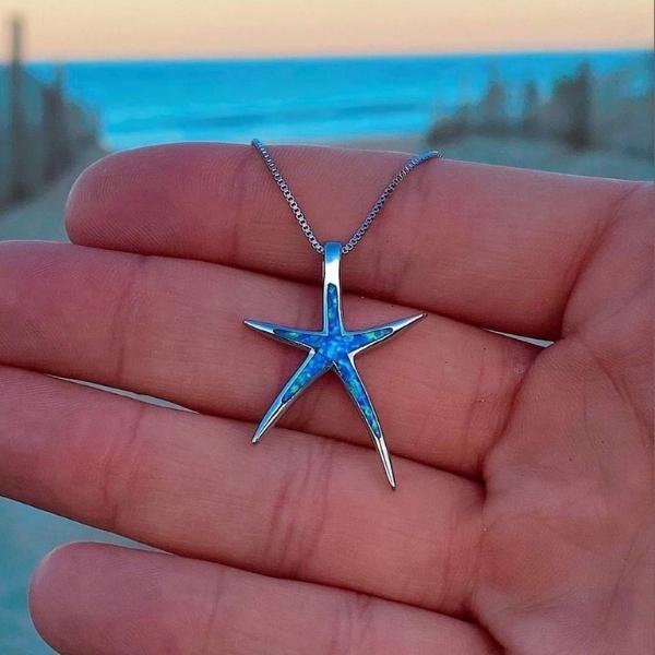 Zilveren ketting met zeesterhanger van blauwe opaal