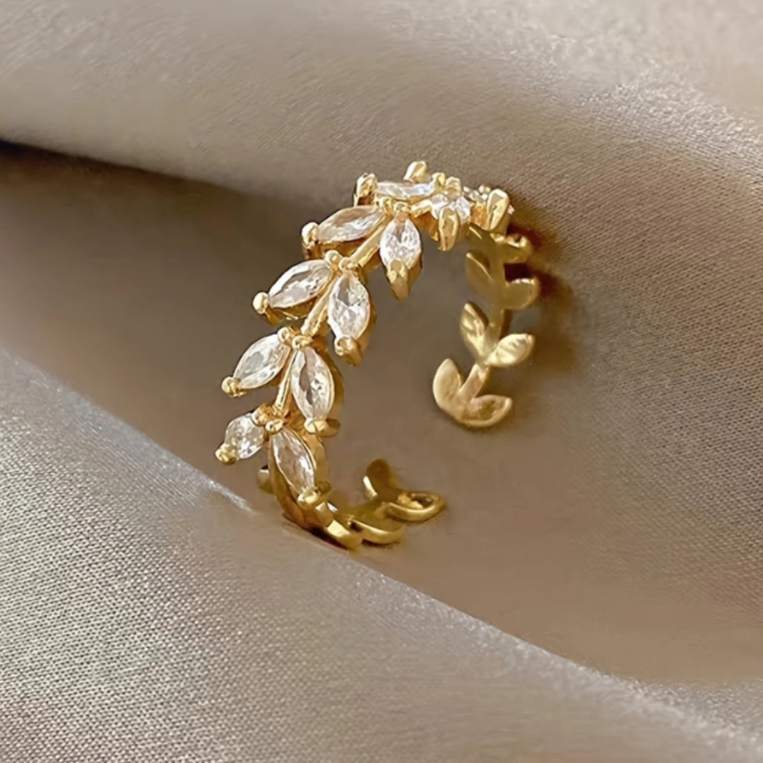 Gouden ring met zirkonia-bladeren