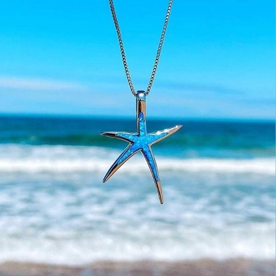 Zilveren ketting met zeesterhanger van blauwe opaal
