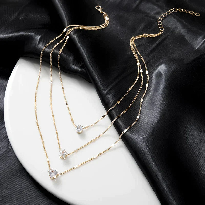 Drie-delige hanger ketting met gouden zirkonia