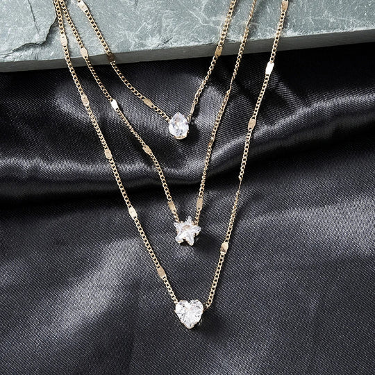 Drie-delige hanger ketting met gouden zirkonia