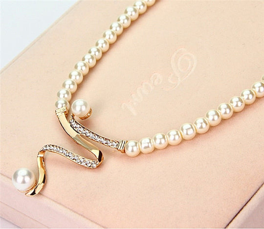Set halsketting en oorbellen met parels