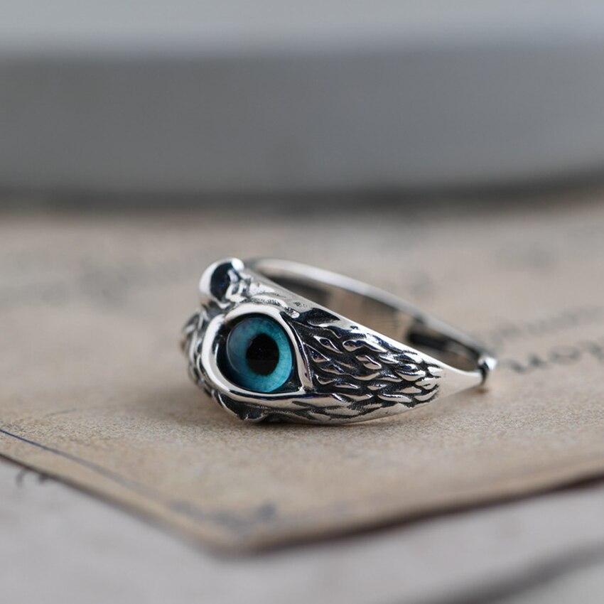 Verstelbare zilveren ring "Uil" met blauwe opaal