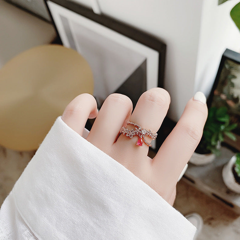 Verstelbare zirkonia ring met robijn in goud