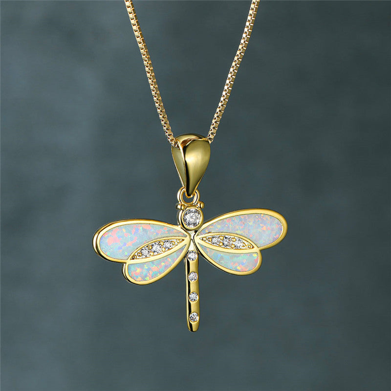 Gouden halsketting met libel-hanger en opaal